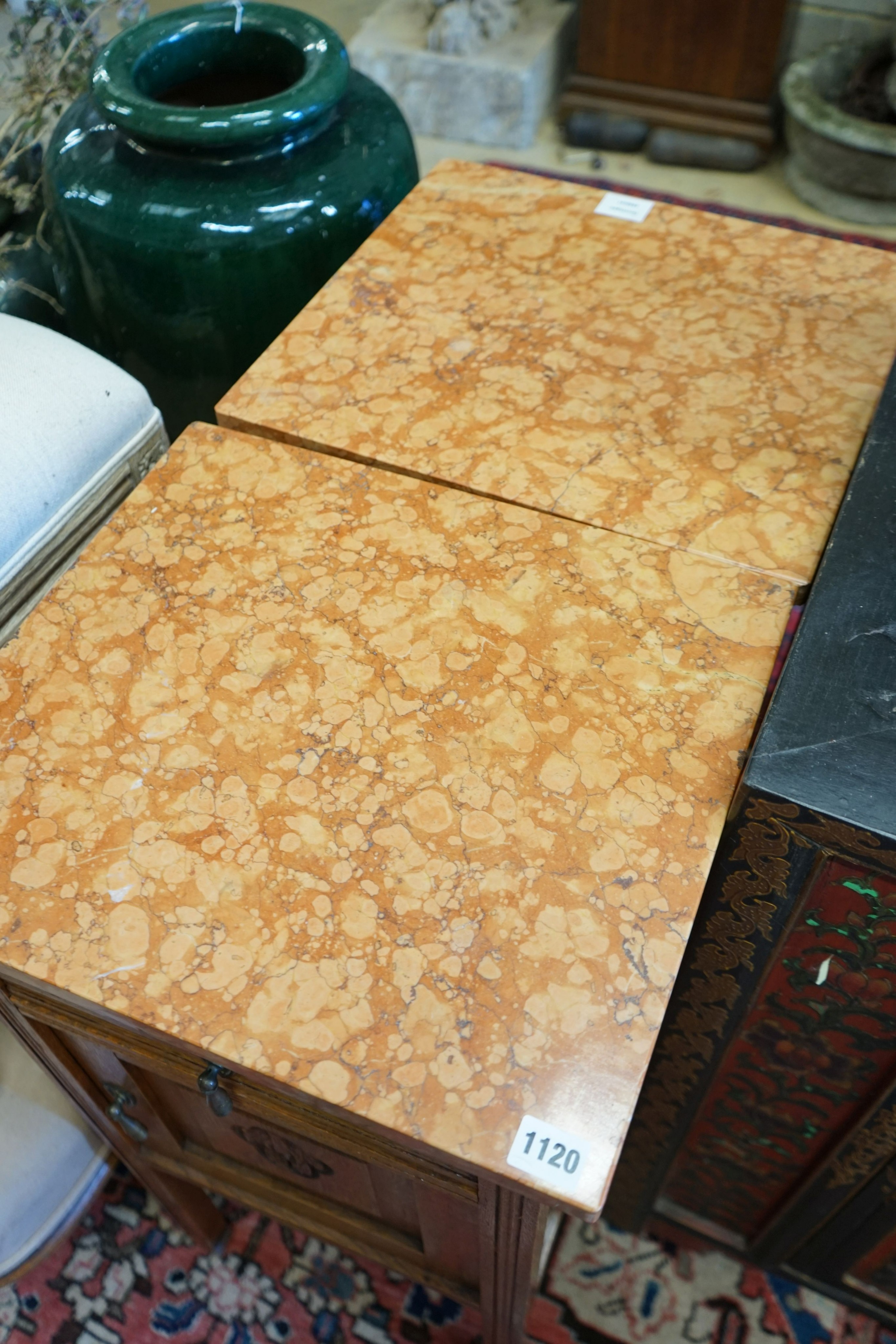 A pair of early 20th century marble topped carved oak bedside cabinets, width 42cm, depth 38cm, height 82cm